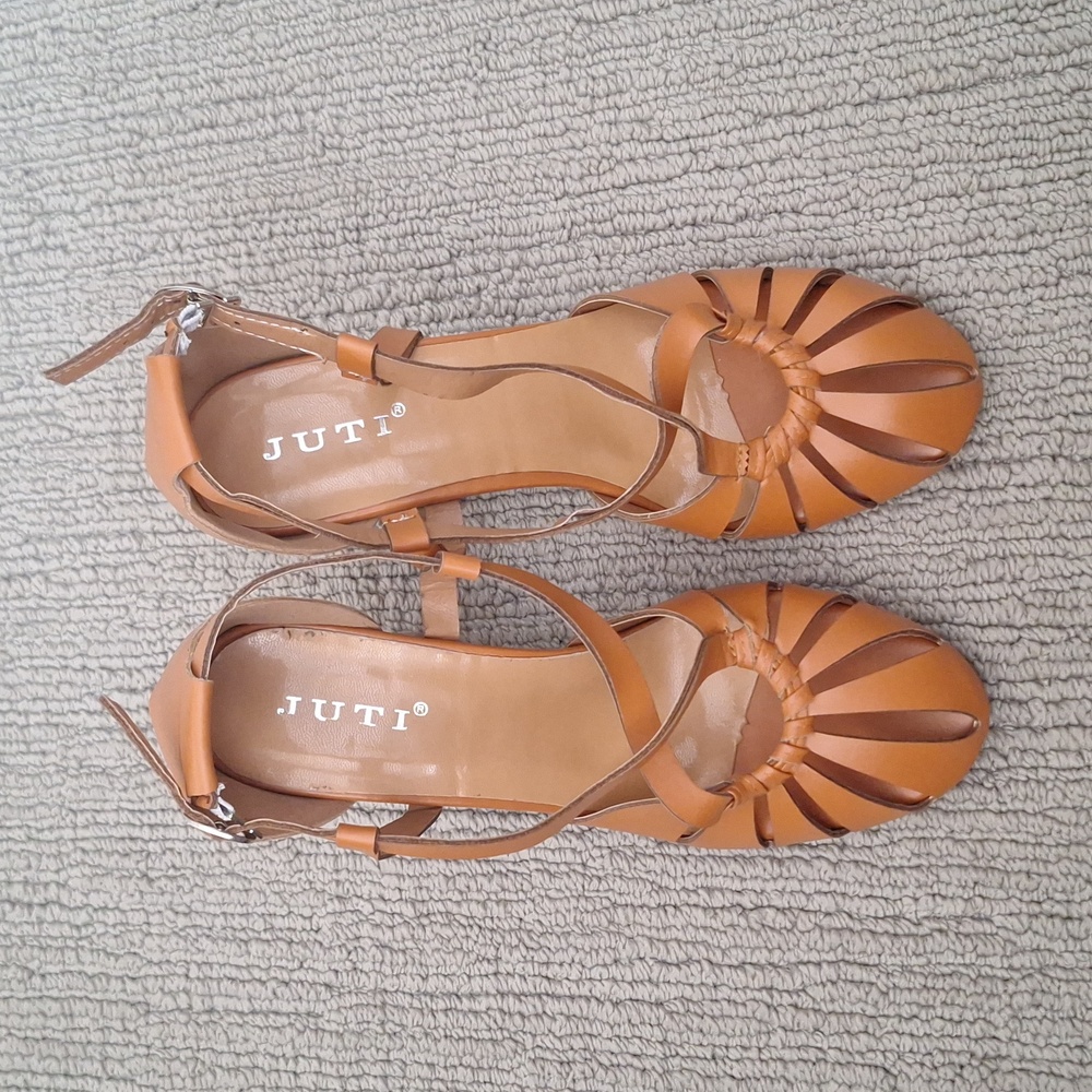 Tan leather heels, never worn